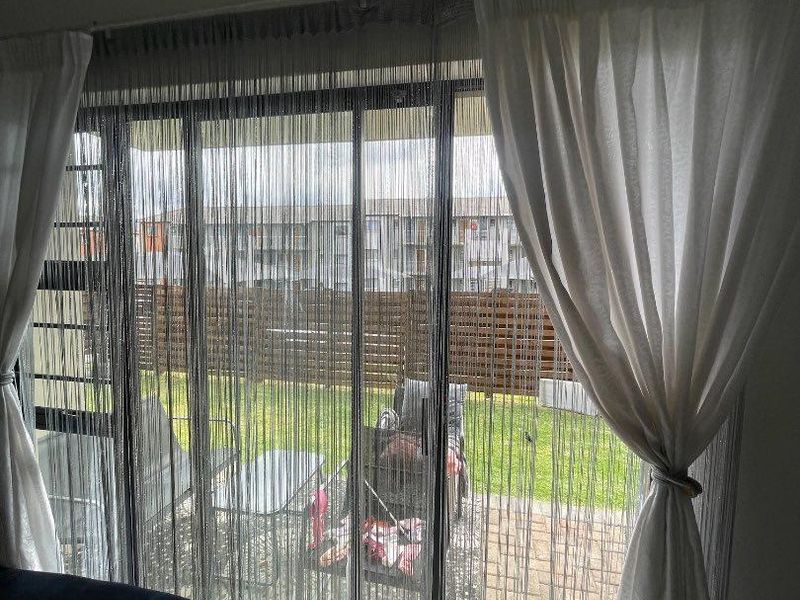 Family-Friendly 4-Bedroom Rental with Outdoor Play Area - Photo 6
