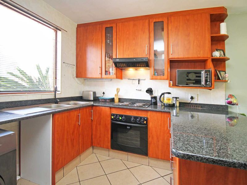 Secure living in a neat complex - Photo 10