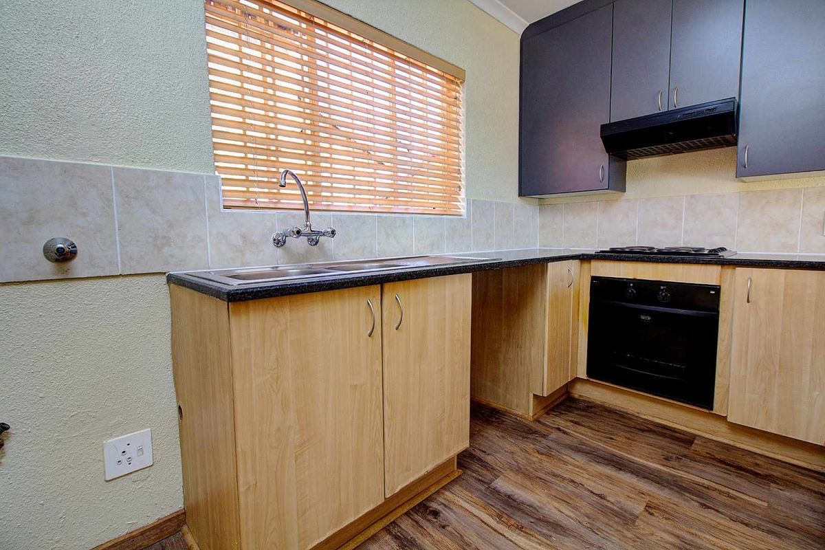 Bright Newly Painted Home with New Laminated Floors! - Photo 5