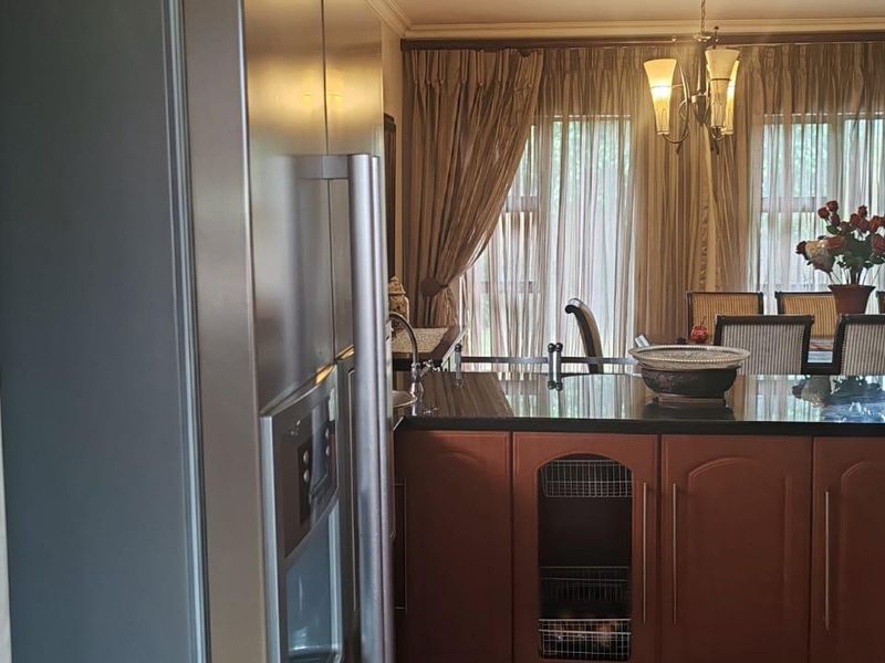 Midrand's Finest: Modern Comfort in a Serene Setting - Photo 4