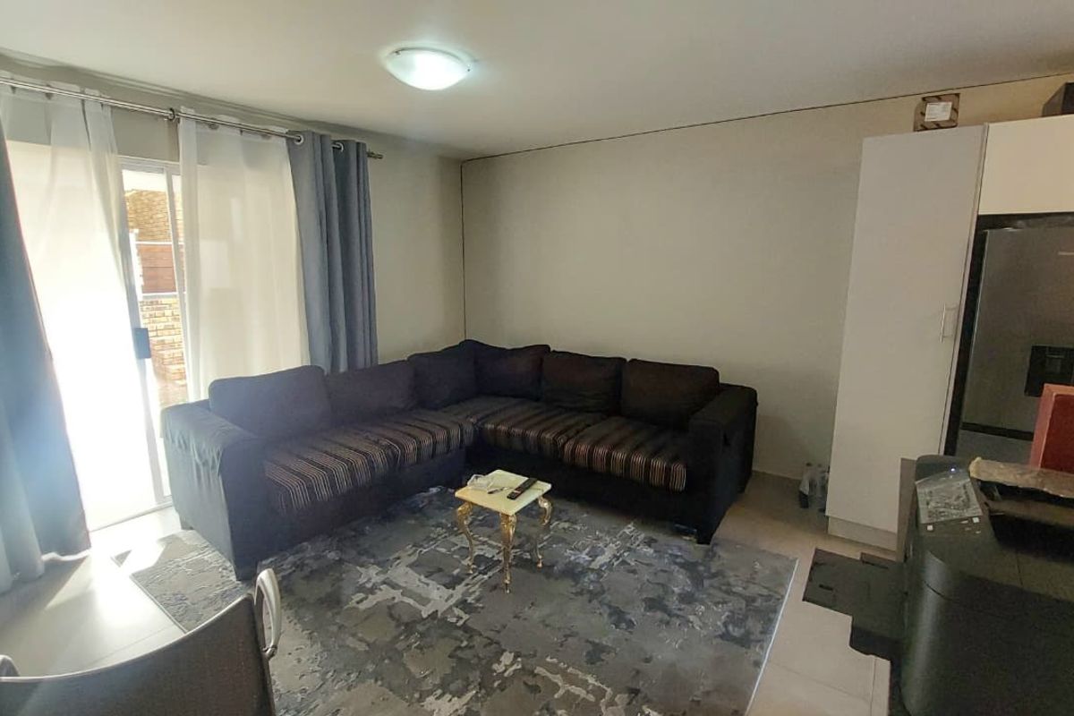 Cozy 2-Bed Ground-Floor Unit with Private Patio & Storage - Photo 5
