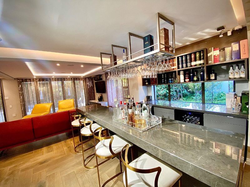 Luxury 5-Bedroom Home with Smart Automation & Triple Garage - Photo 10