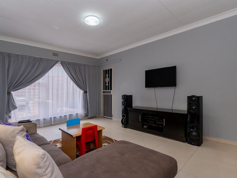Spacious 3-Bedroom Family Home with Flatlet in Secure Boomed Area Birch Acres - Photo 4