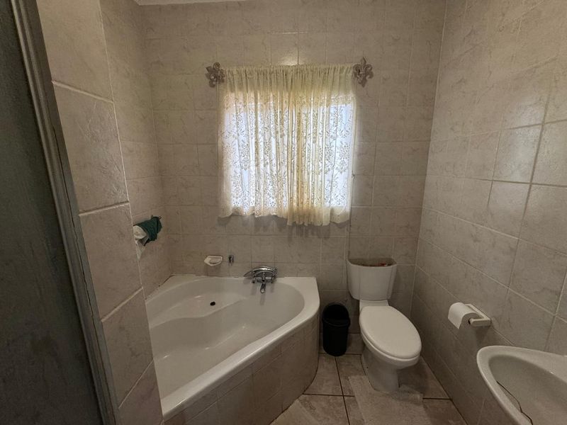 Charming Family Home with Outdoor Delight in Southridge - Photo 10