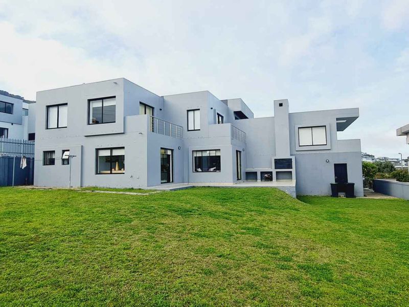 Elegant Family Living with Spectacular De Grendel Wine Farm Views - Photo 7