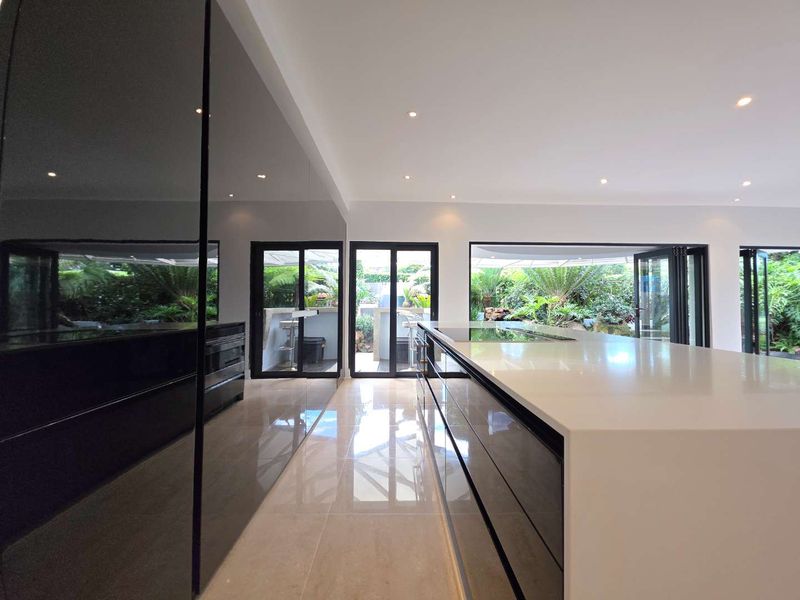 ​Freshly Renovated Masterpiece with Golf Course Frontage - Photo 2