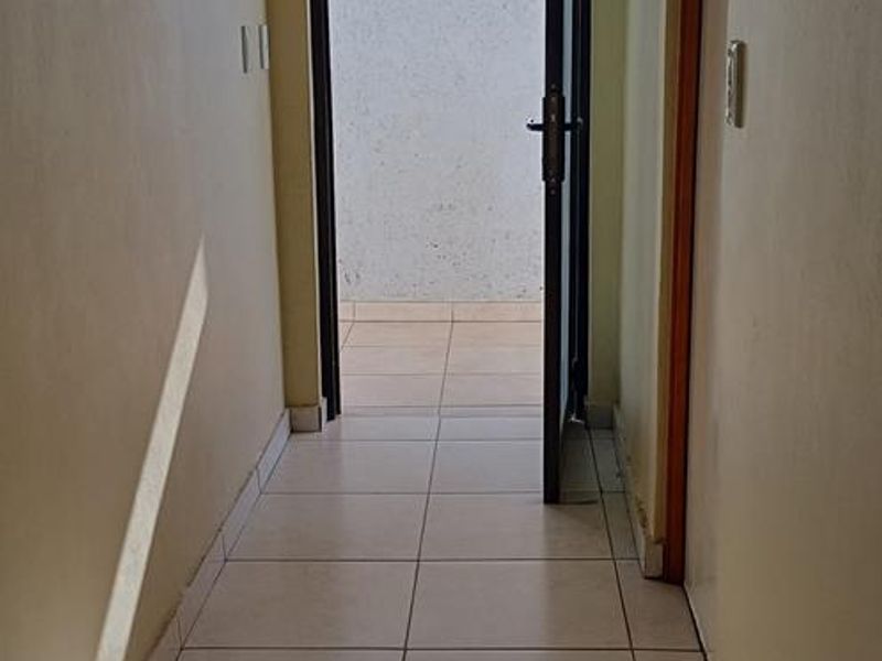 This affordable apartment in Extension 6 is ideal for single professionals, young couples, and first-time buyers wanting a safe and cozy place to call home! 🏡 - Photo 8