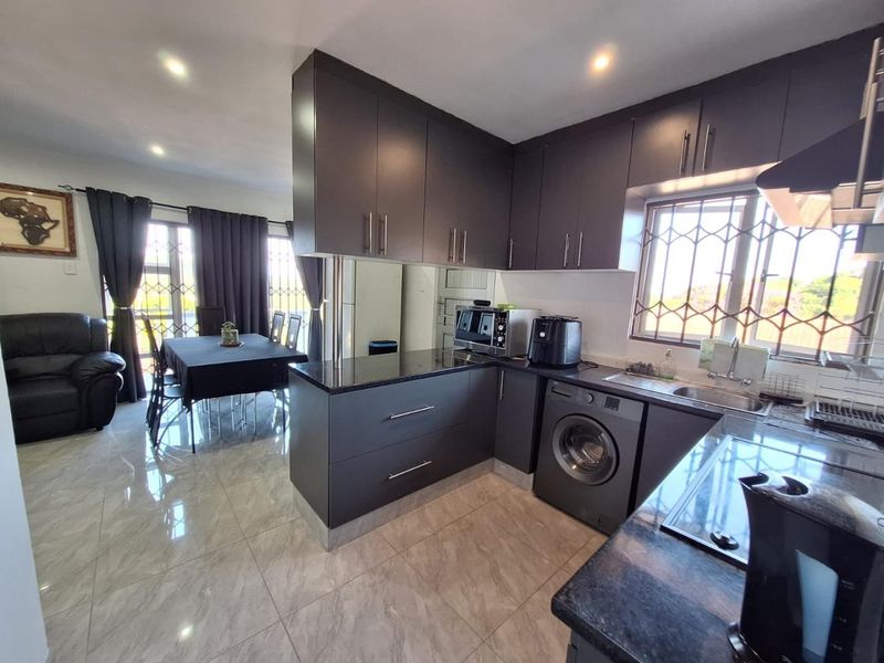 A TOWNHOUSE WITH AN OASIS OF COMFORT AND RELAXATION - Photo 1