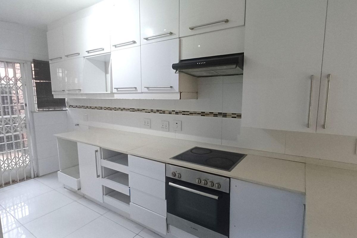 Spacious, Affordable Double-Storey Living with Patio & Pool - Photo 3