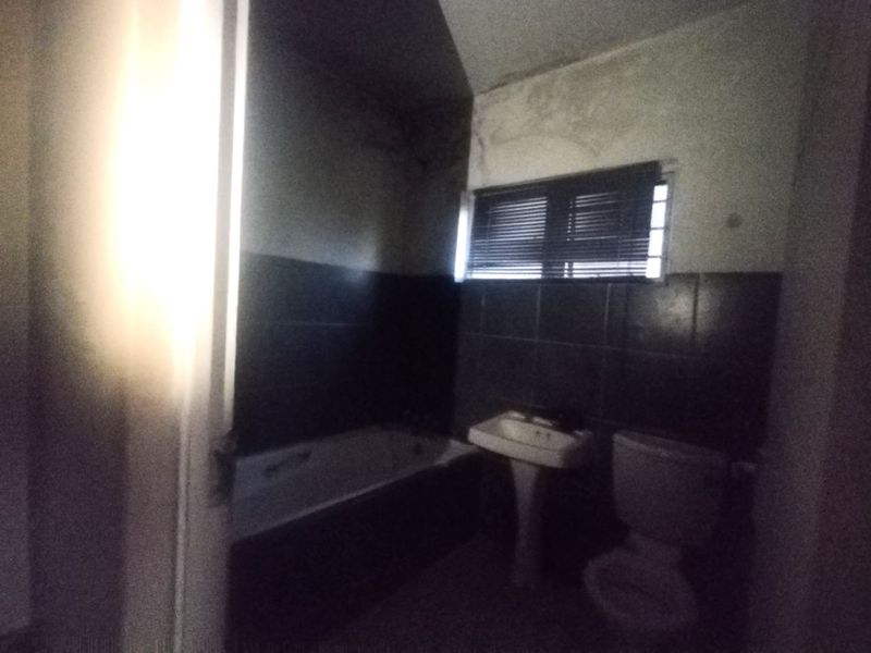 Unlock Potential: Fixer-Upper in Prime Nicolus Estate - Photo 4