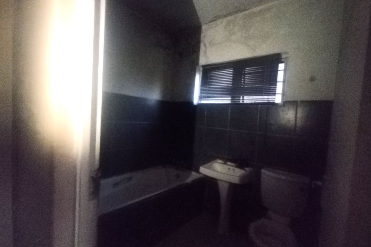 Unlock Potential: Fixer-Upper in Prime Nicolus Estate - Photo 4