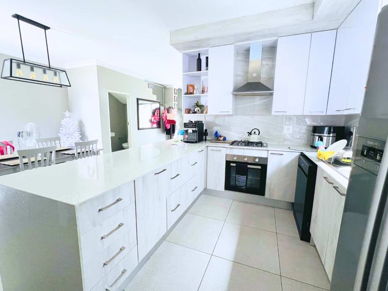 Modern Double-Storey Home in Prestigious Security Estate - Photo 6