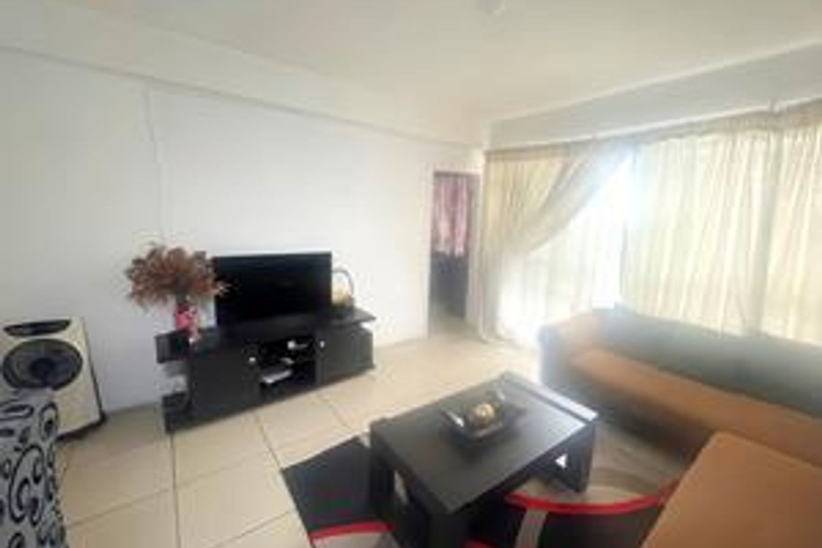 Prime Location,Your Ideal Home Awaits, 2 Bedroom 1st floor unit - Photo 3