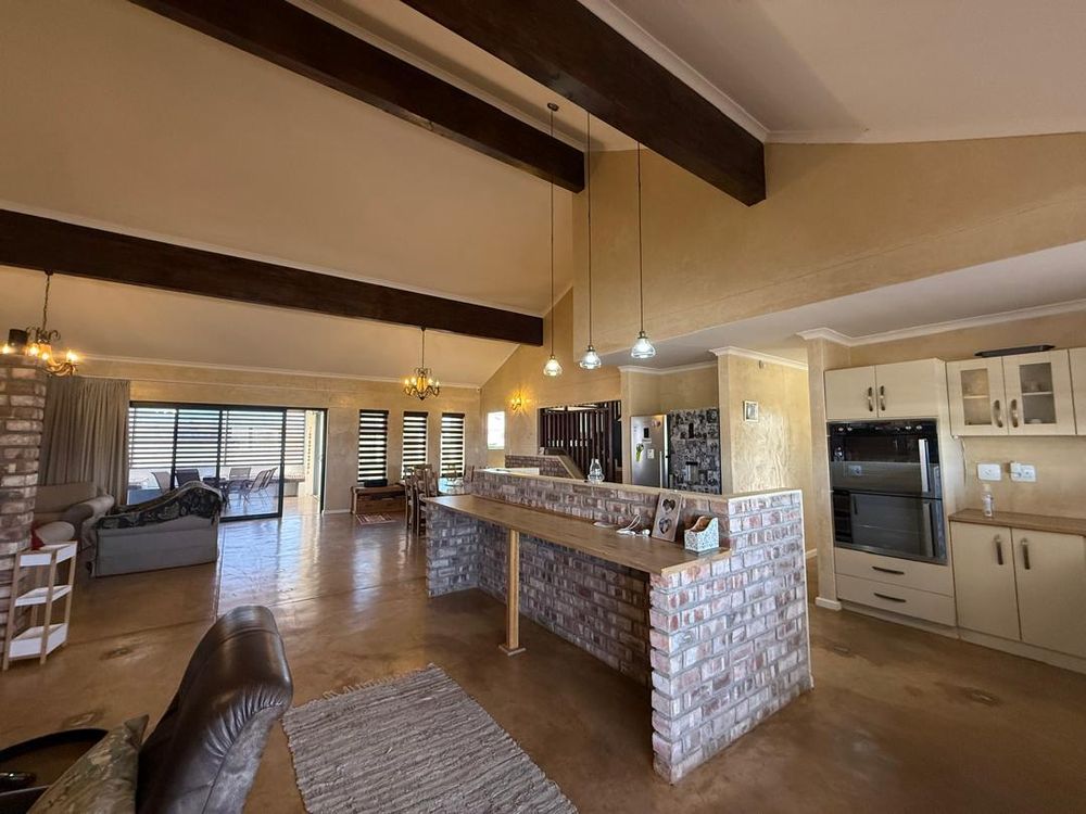 Open plan kitchen, dining area and two lounges