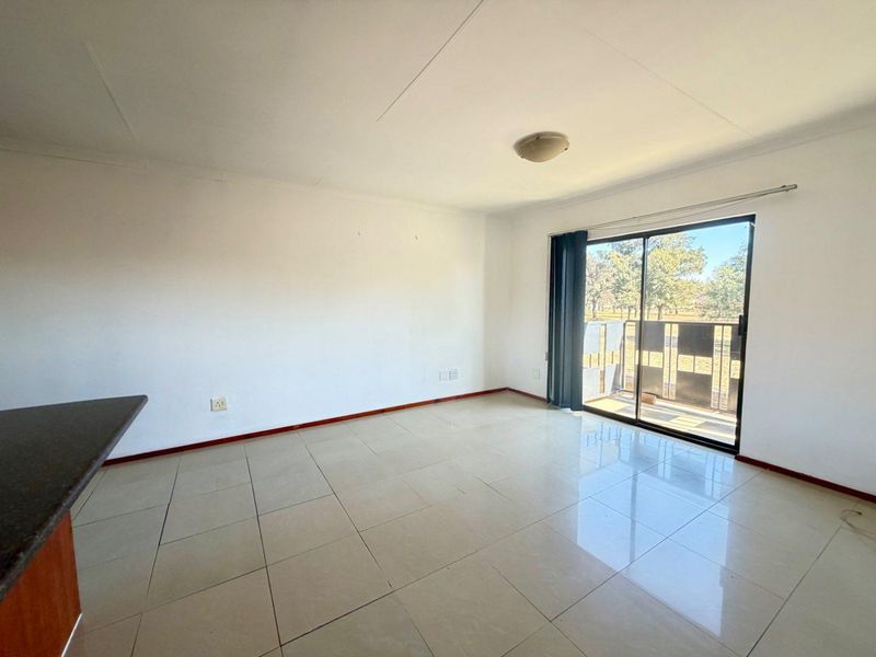 First Floor Low Maintenance Facebrick Unit in Well Managed Complex - Photo 3