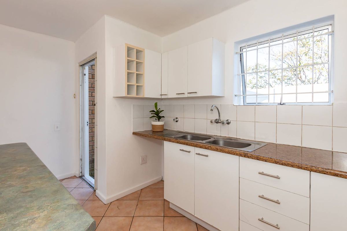 Elegant Double-Storey Living in a Secure, Sought-After Setting - Photo 5