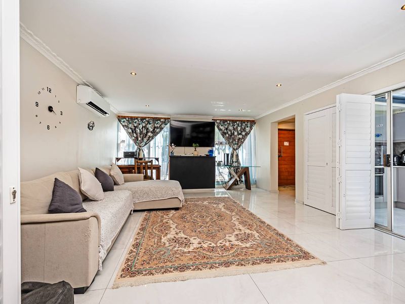 Striking Modern Family Home with Designer Finishes and Effortless Entertaining in Prime Panorama - Photo 2