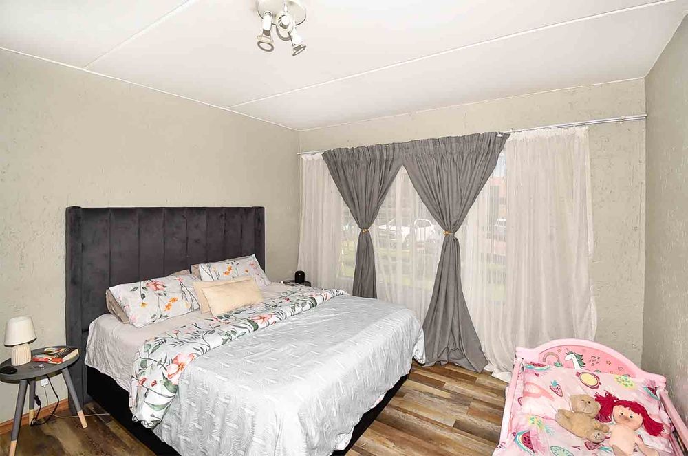 Large bedroom with commercial grade vinyl