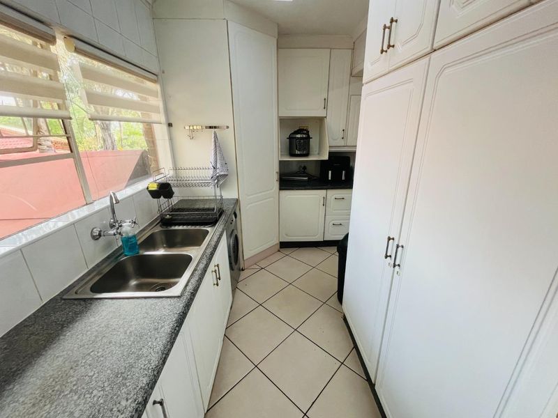 Freestanding four-bedroom home in the heart of Meyersdal | No levies | Indoor braai, bar & pool - Photo 6