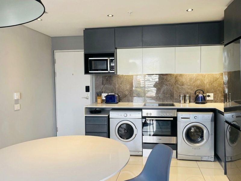 MODERN 1 BEDROOM APARTMENT AT CAPITAL SANDTON - Photo 10