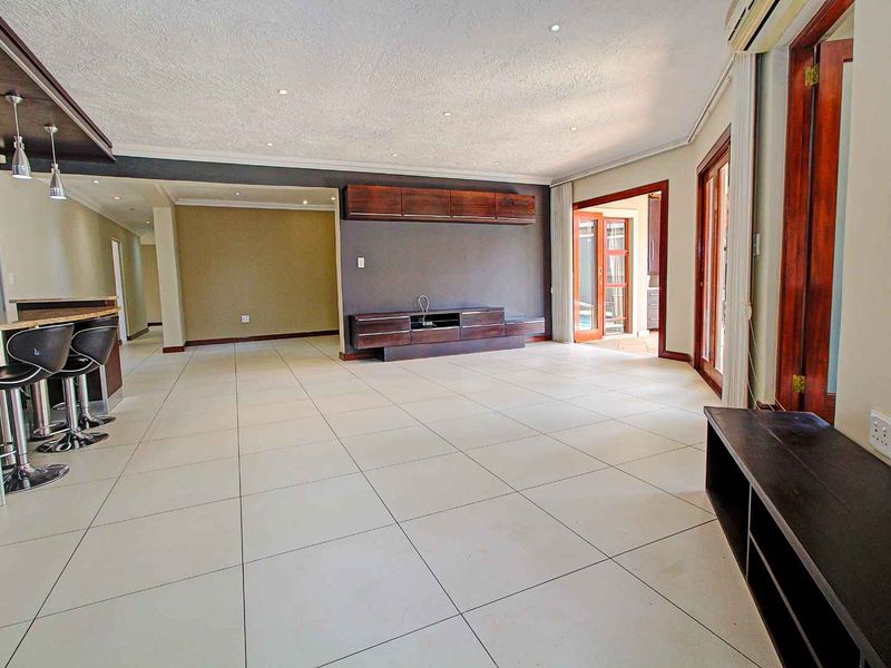 Luxurious Freestanding Home with Modern Finishes and Poolside Oasis - Photo 6