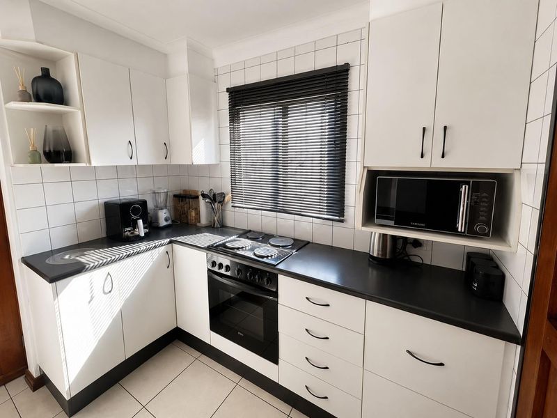 **Charming 2-Bedroom spacious yard home for sale in Roodekop - Photo 6