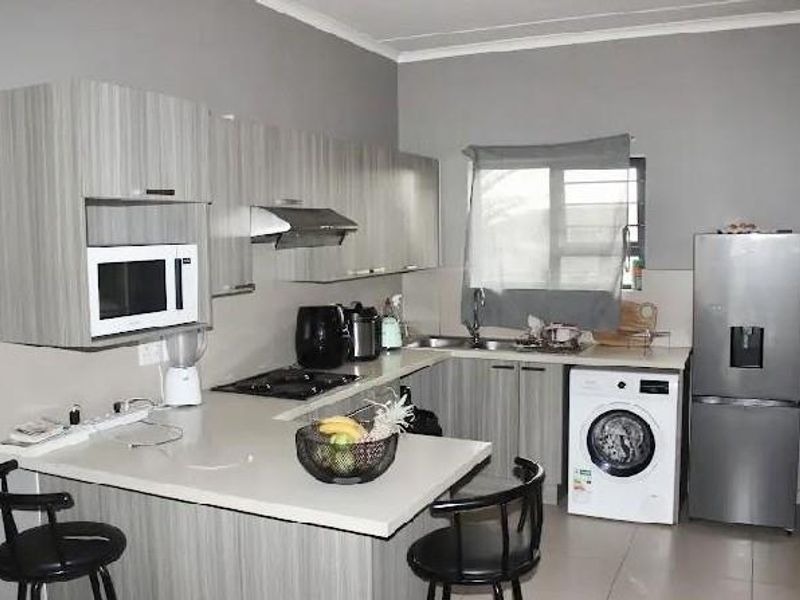 Modern Living with Prepaid Electricity & Metered Water! - Photo 2