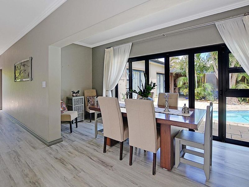 Exceptional 5-Bedroom Home with Versatile Studio in Flamingo Vlei - Photo 10
