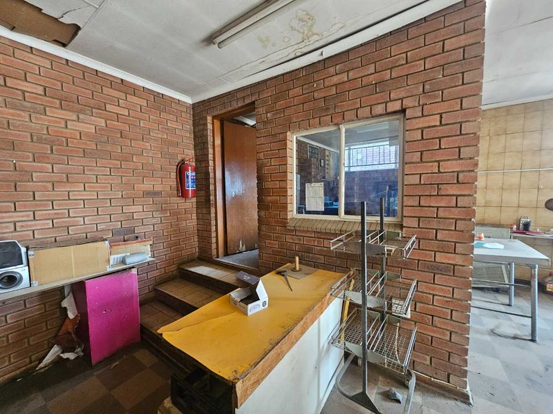 Versatile Commercial Property with Retail and Warehouse Buildings and Cold Storage - Photo 9