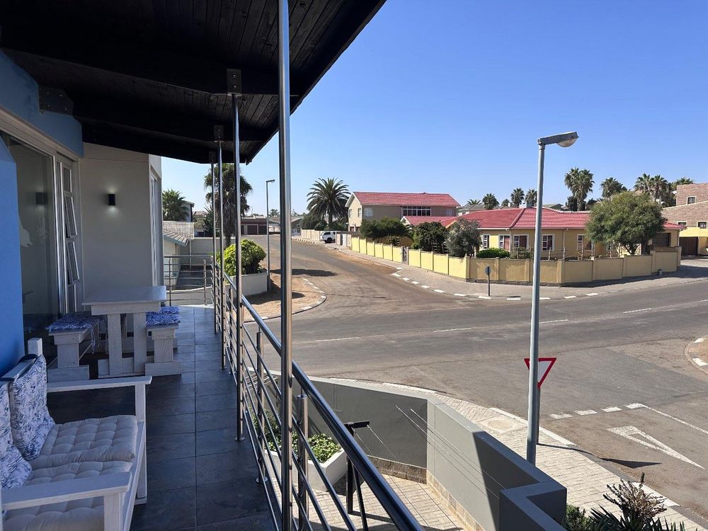 Main Flat, 2 suite bedrooms, open plan kitchen with lounge and inside barbecue and balcony.