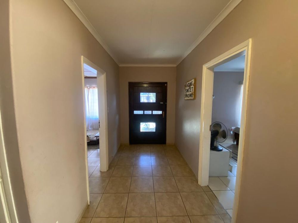 Loung to the left, entrance door and right is the main bedroom