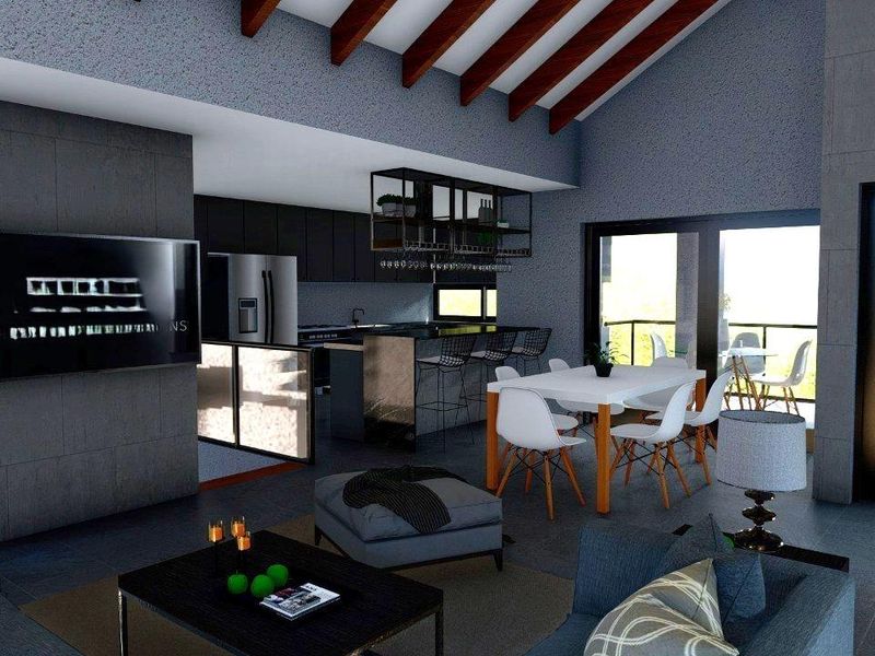 Modern open-plan living and kitchen area featuring high vaulted ceilings with exposed timber beams, stone feature walls, and seamless indoor-outdoor flow.