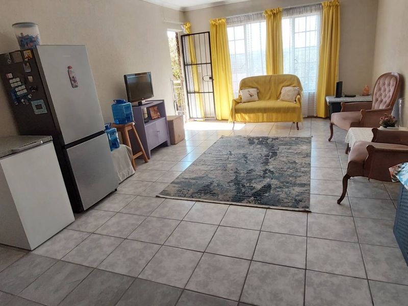 Secure Living: 2 Beds, Balcony, Carport & Storage Galore - Photo 3