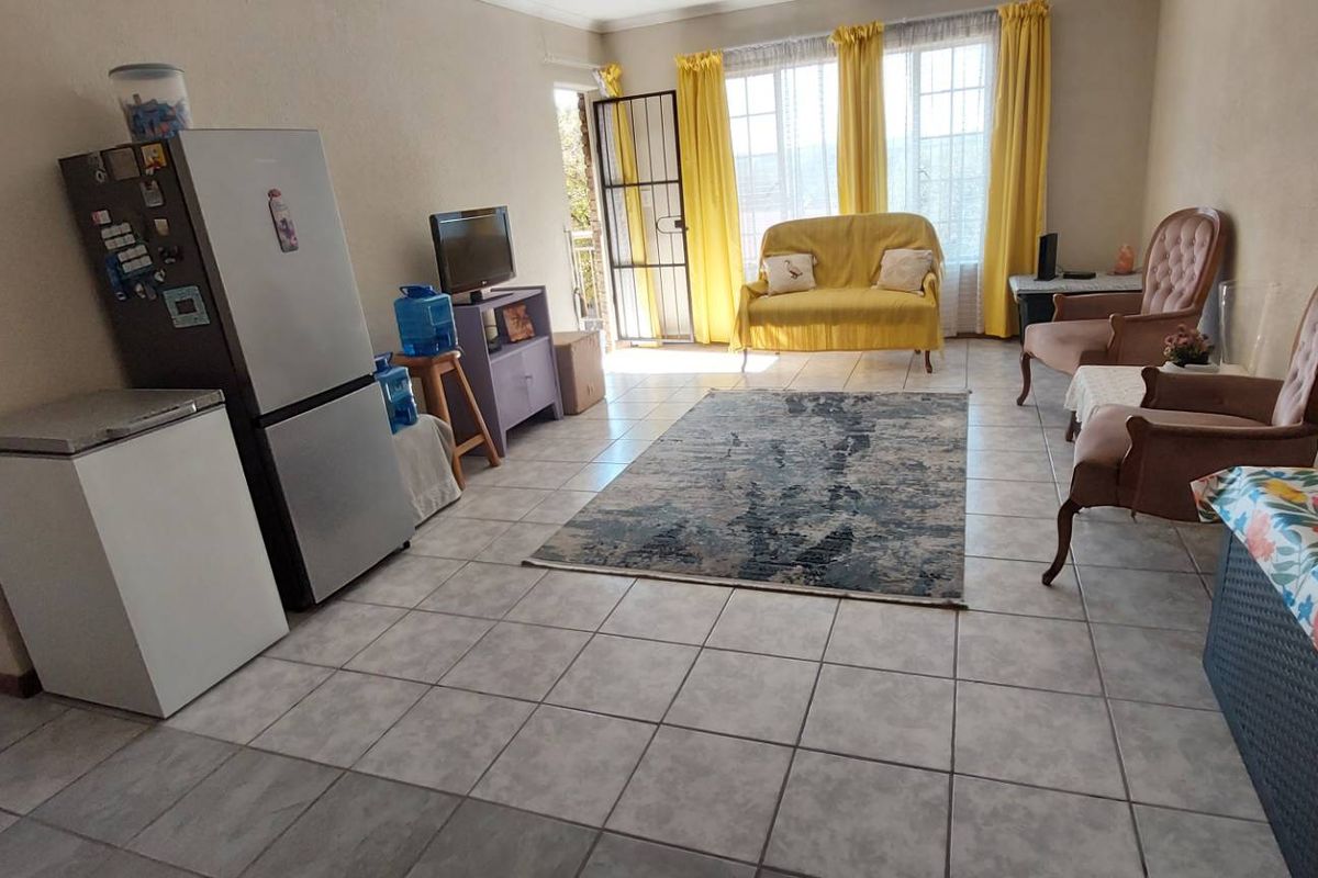 Secure Living: 2 Beds, Balcony, Carport & Storage Galore - Photo 3