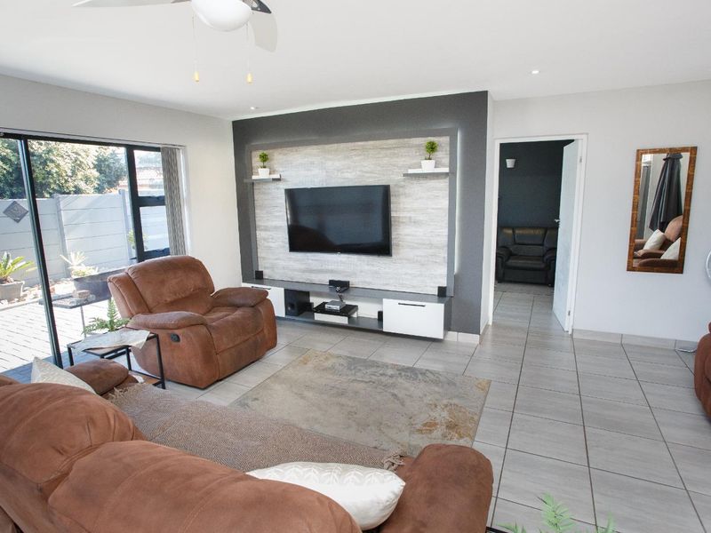 Elegant 5 Bedroom Home in Reebok with Income-Generating Potential - Photo 9