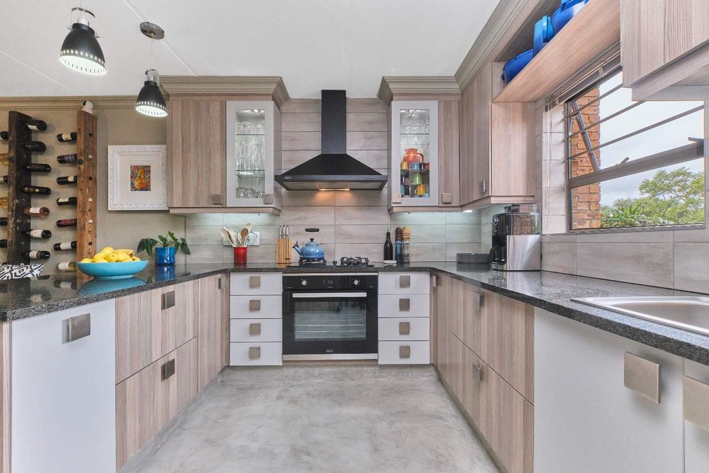 Modern kitchen with gas hob.