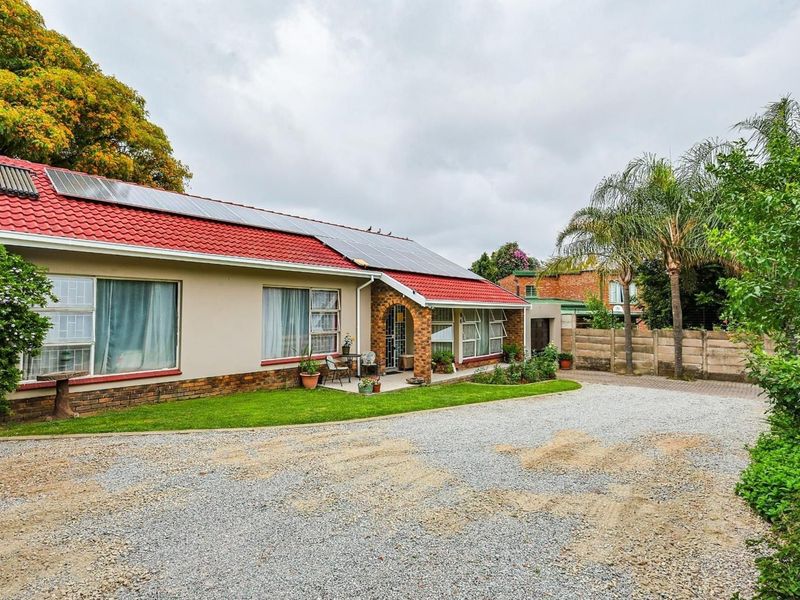 Family Home with Flatlet, Solar Power, and Pool in Sought-After Rooihuiskraal - Photo 7