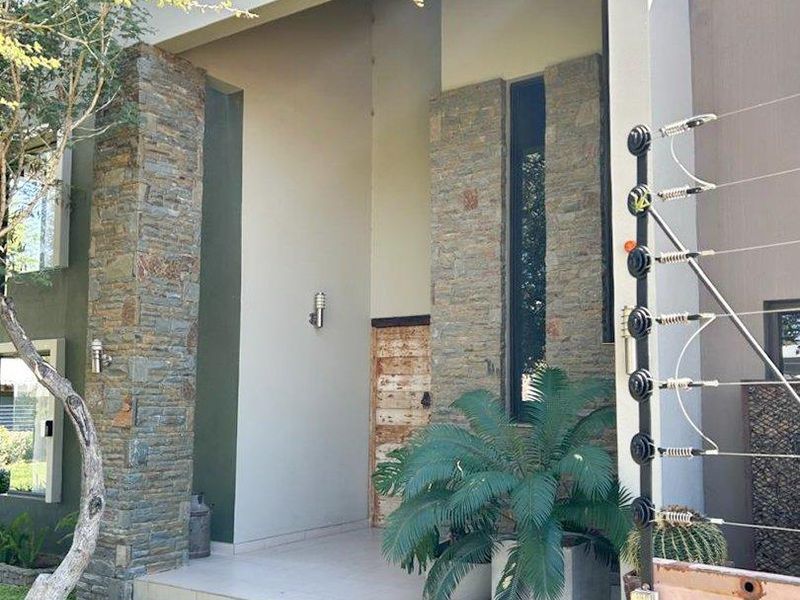 Modern 5-bedroom double story property with serene views. - Photo 3