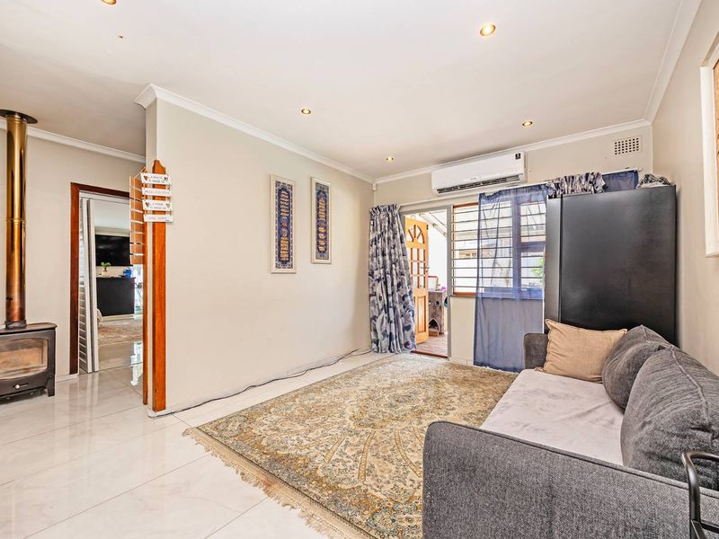 Striking Modern Family Home with Designer Finishes and Effortless Entertaining in Prime Panorama - Photo 4