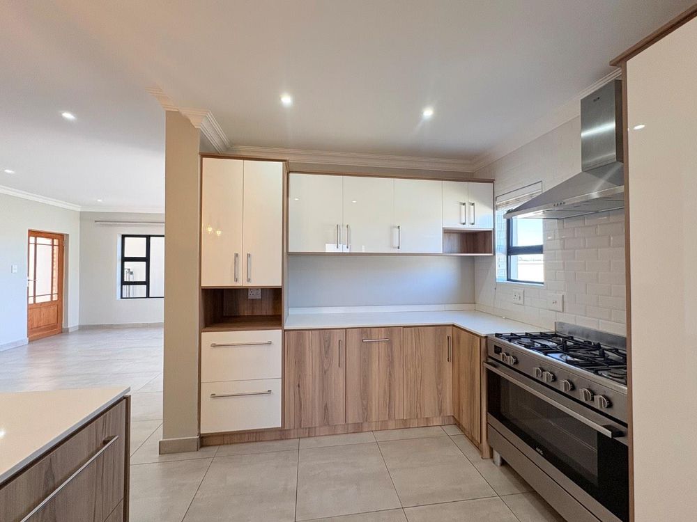 Modern Kitchen with ample cupboards.