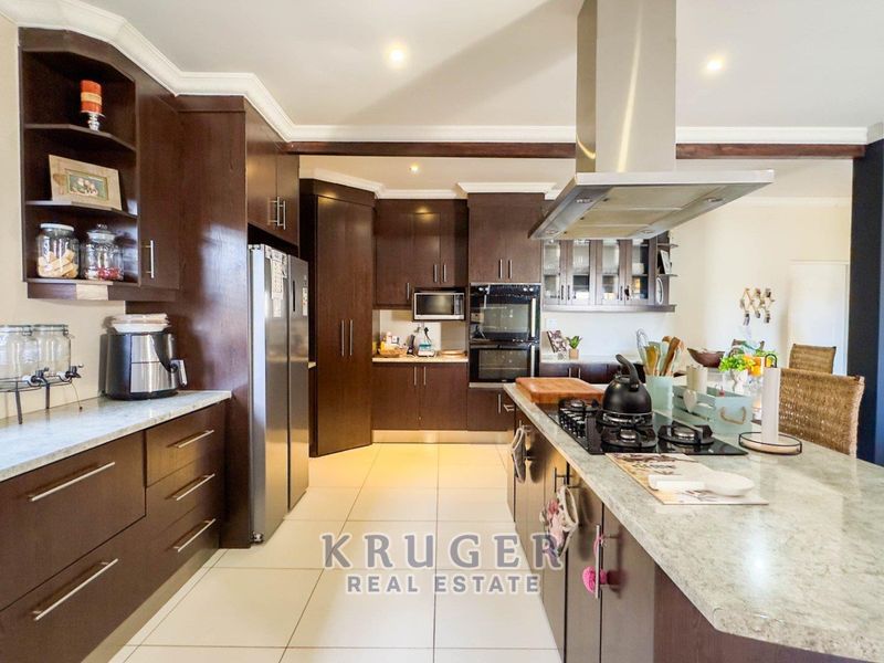 A HOME THAT WHISPERS LUXURY - Photo 4