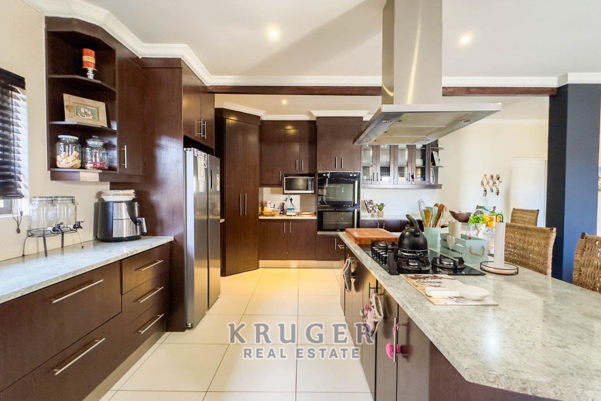 A HOME THAT WHISPERS LUXURY - Photo 4