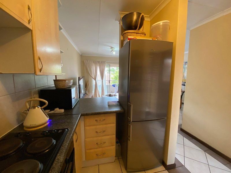 Charming Top-Stack Unit with Stunning Views! - Photo 5