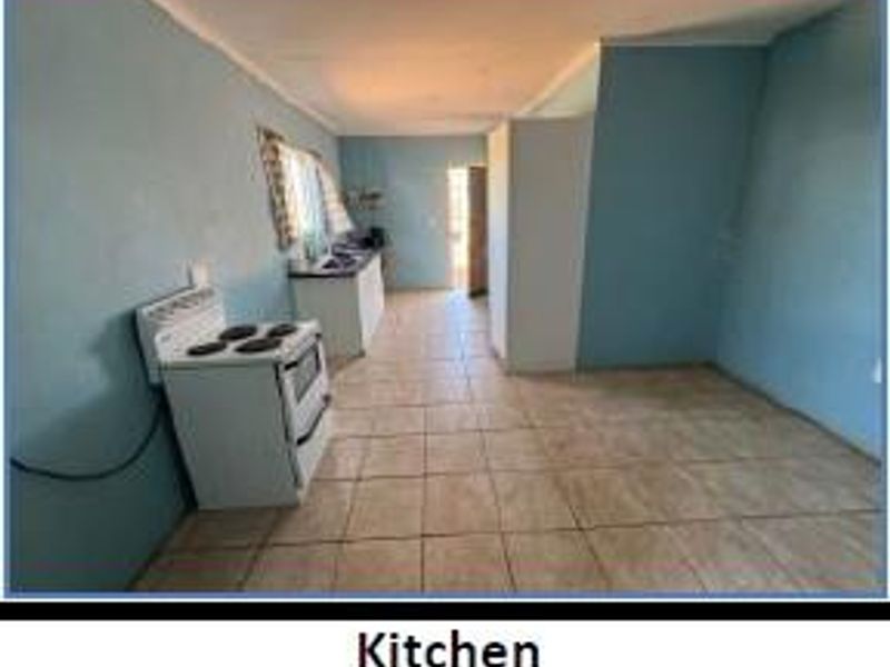 Charming Three-Bedroom Gem Awaits Your Touch - Photo 6