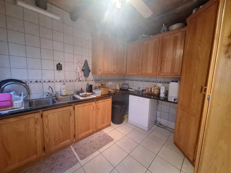 Charming Double-Story Home with Modern Amenities and Eco-Friendly Features - Photo 6