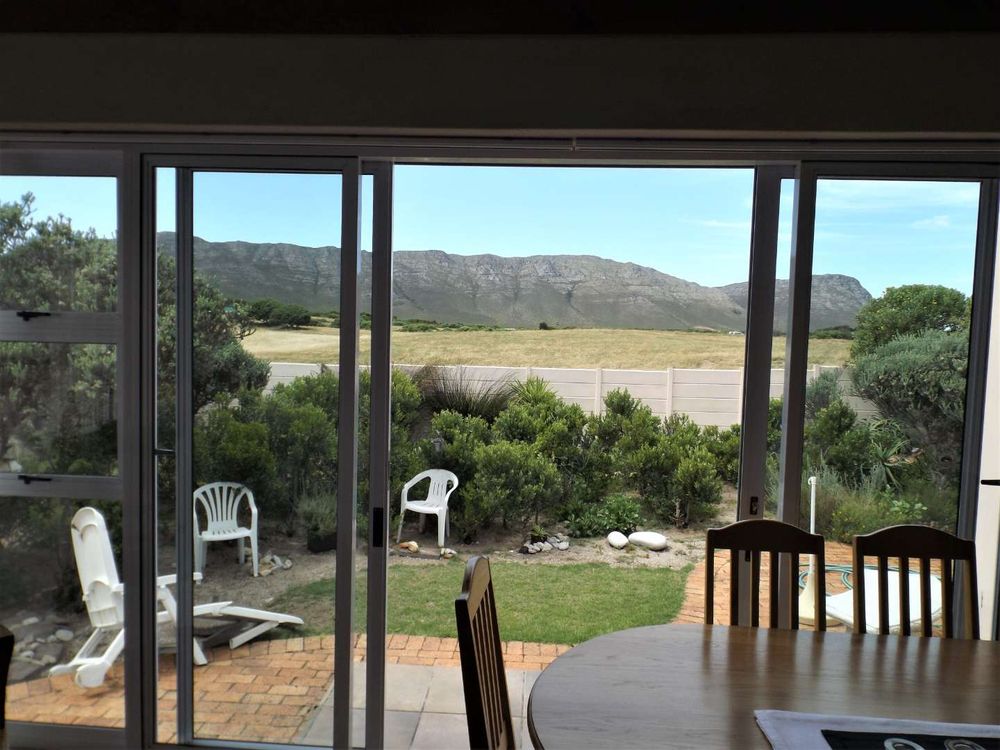 View from the backyard of a neighbour's BBQ Room - facing to the back (in the direction of Mountain).