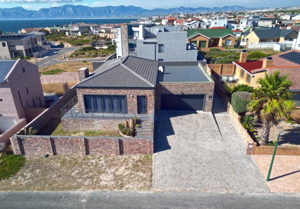 Front View of Dwelling (in Perlemoenbaai) - with Ocean at the back.