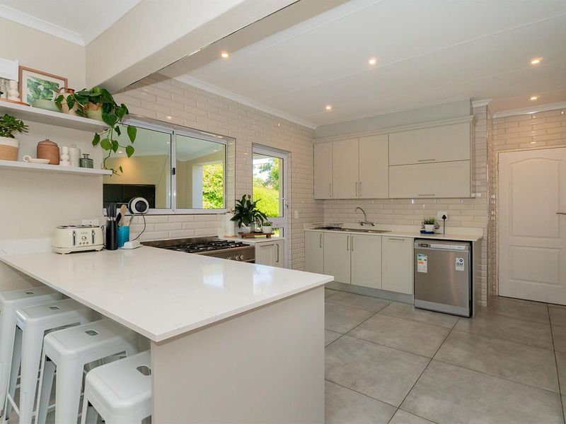 Stylish 4-Bedroom off-grid Family Home in Secure Van Riebeeck Park Enclosure - Photo 7
