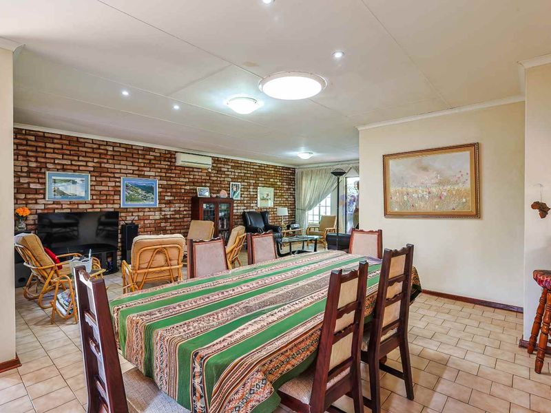 Secure, Off-Grid 4-Bedroom Home – A Rare Find in Faerie Glen - Photo 8