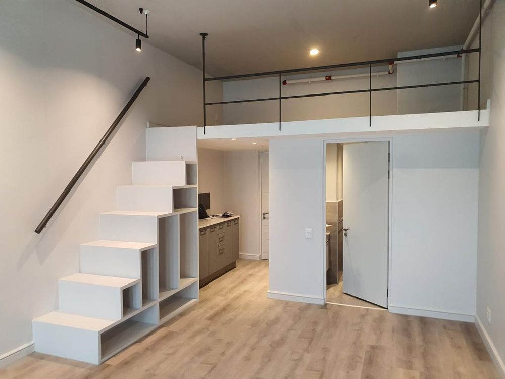 Open plan layout with a mezzanine bedroom